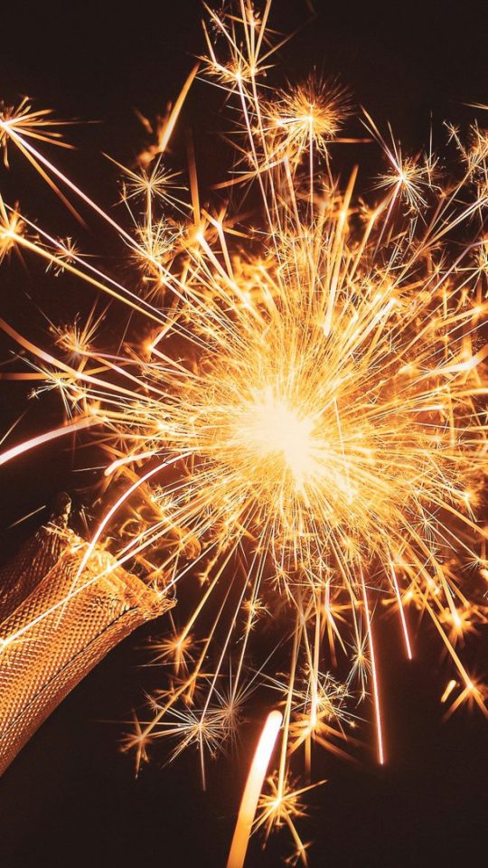 a bottle of champagne with sparklers at The Hudson